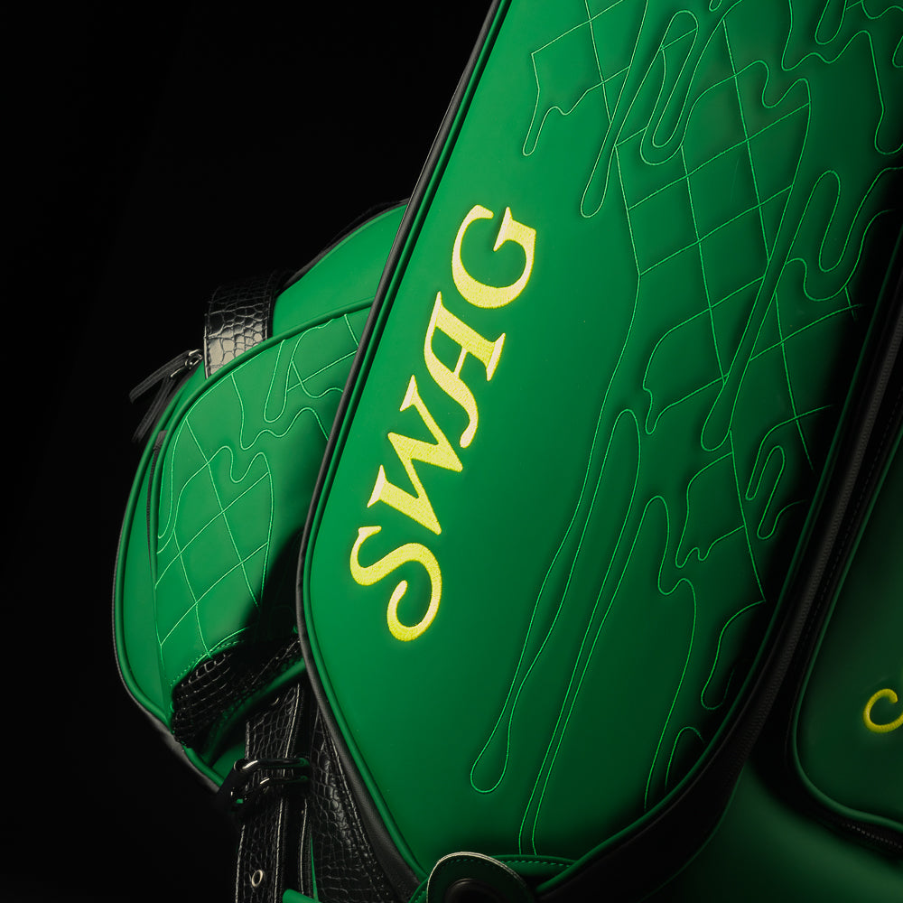 SWAG Golf green quilted melt skull tour staff golf bag with faux croc details.