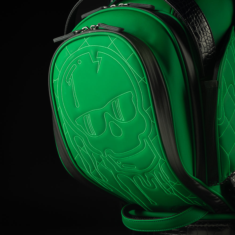 SWAG Golf green quilted melt skull tour staff golf bag with faux croc details.