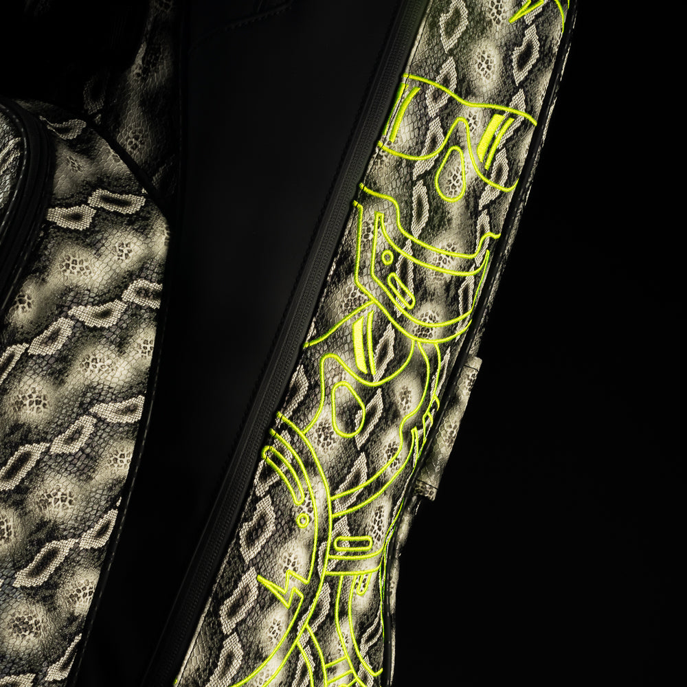 SWAG Golf faux snakeskin black, grey, and neon yellow golf stand bag.