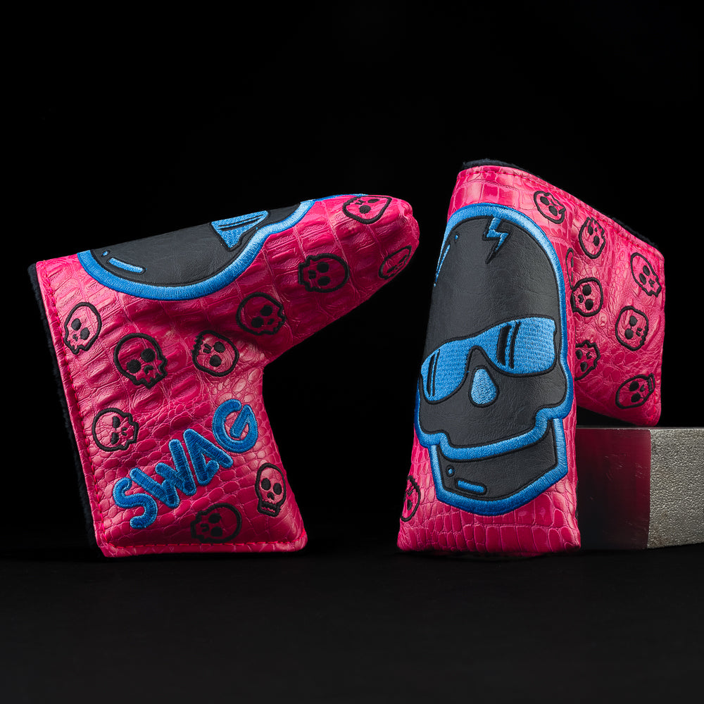 Hot Pink Blade with black and blue skull golf club headcover.