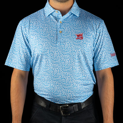 Peter Millar x SWAG light blue golf polo with mini icon print and embroidered red SWAG King logo on chest.