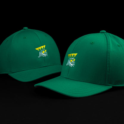 SWAG Golf green golf hat with embroidered King detail on the front and snapback closure.