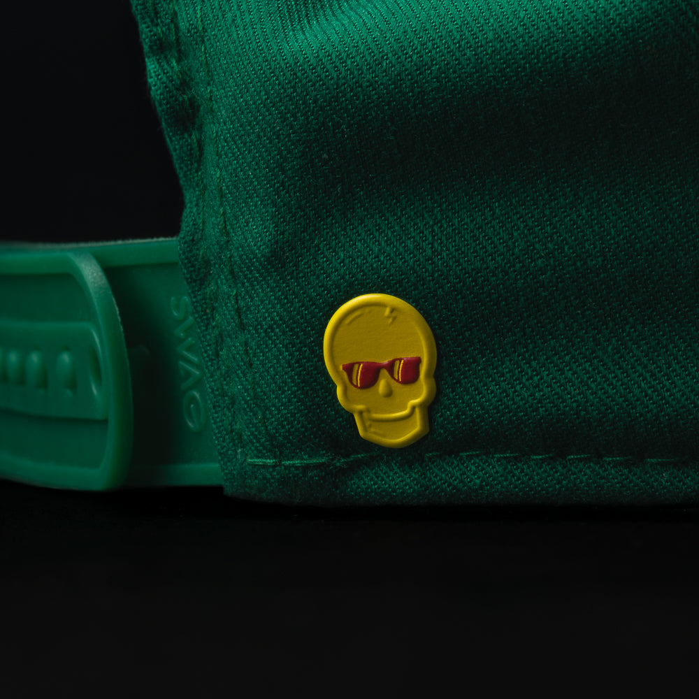 SWAG Golf green golf hat with embroidered King detail on the front and snapback closure.