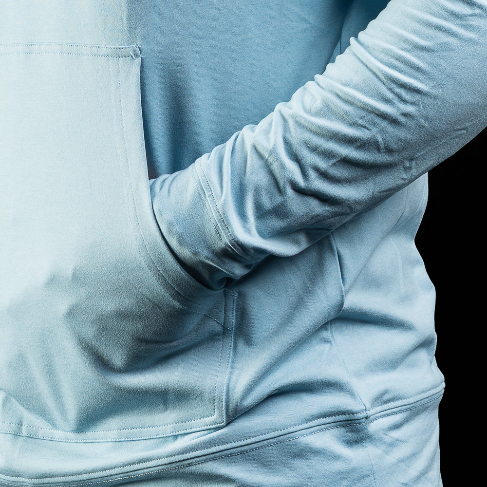 SWAG Golf x AndersonOrd blue fog heather long sleeve performance men's golf hoodie.