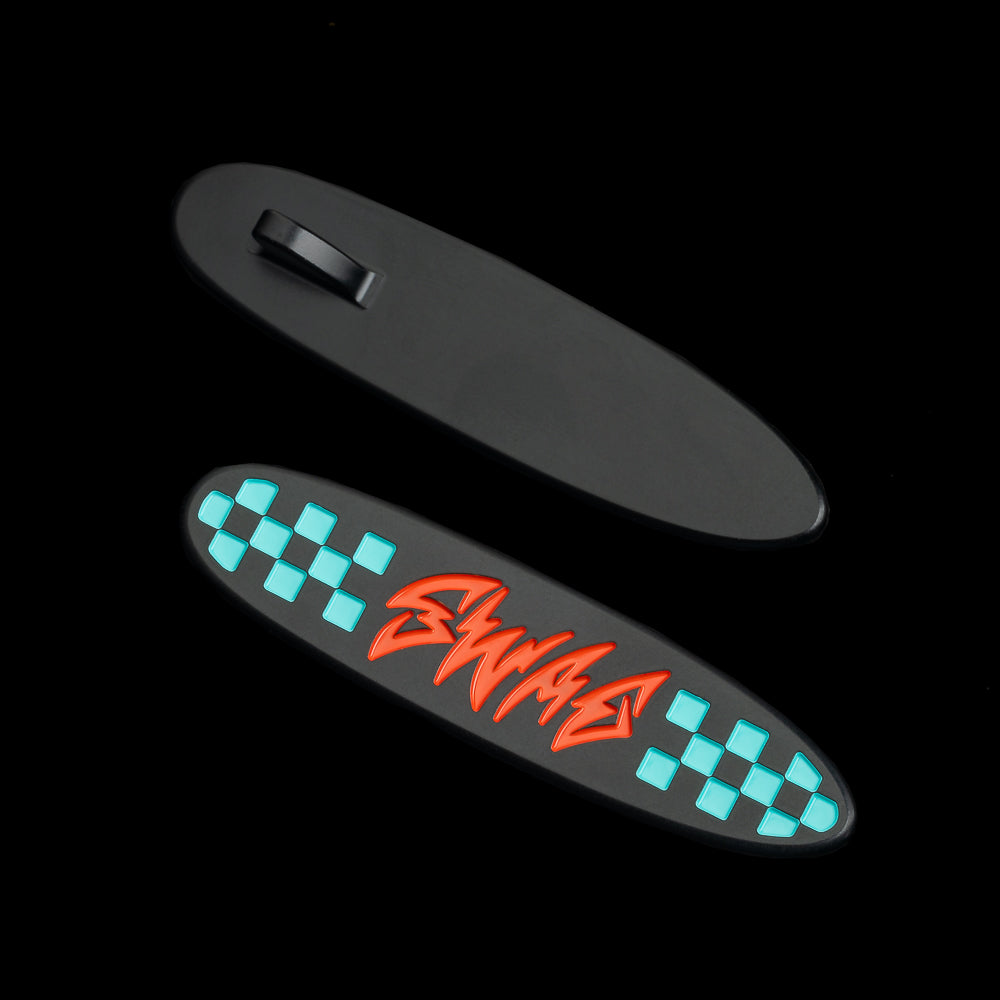 SWAG Golf black surfboard black nano coated stainless steel golf ball marker.